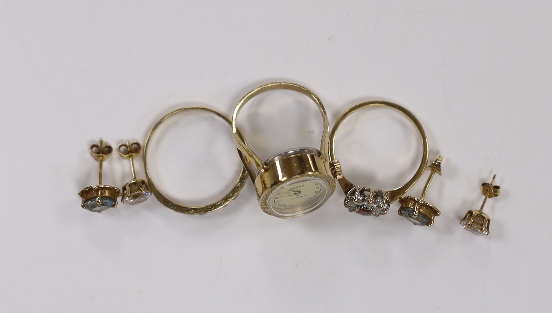 A modern 9ct and CZ set cluster ring, two other rings including watch ring and two pairs of 9ct ear studs.